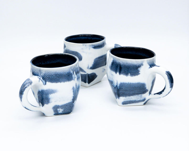 https://www.edgecombpotters.com/cdn/shop/files/pottery-wave-mugs-2.jpg?v=1700060711&width=720