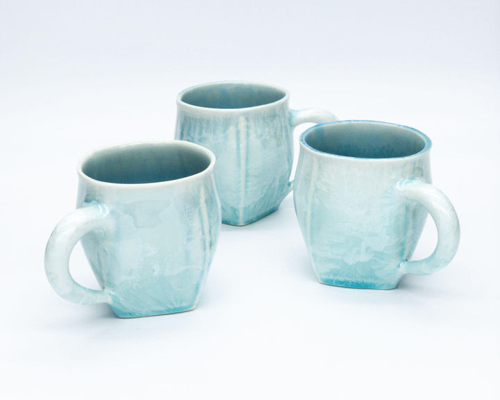 https://www.edgecombpotters.com/cdn/shop/files/pottery-wave-mugs-4.jpg?v=1700060711&width=720
